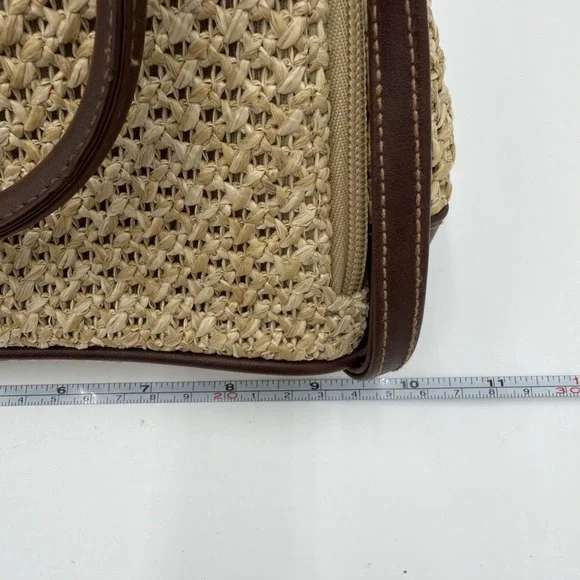 Rosetti straw tote handbag with brown faux leather trim and top handles. - Picture 15 of 16